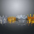 Four Silver And Gold Crowns With Ornate Designs As Decorative Household Items