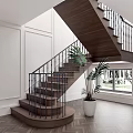 Elegant Wooden Stairs With Metal Railing And Plant In Indoor Space With White Walls