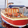 Red And Blue Sailboat Yacht With Tall Mast And Wooden Deck On Sea