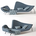 Unique Shaped Blue Fabric Sofa With Cushions Throw Blanket And Metal Legs