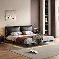 Modern Double Bed With Black Leather Headboard White Sheets Red Cushion And Brown Blanket