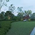 Park Landscape With Green Lawn Trimmed Shrubs Trees White Deer Sculpture Pathway And Evening Lighting