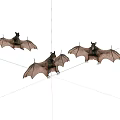 Three Flying Bats in Mid Air with Spread Wings and Natural Flight Posture