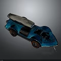 Blue Toy Race Car With Silver Top Red Rimmed Wheels And Shiny Metallic Finish