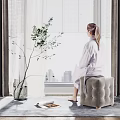 Elegant Velvet Curtains with Sheer Panels by Window and Cozy Pouf Setup