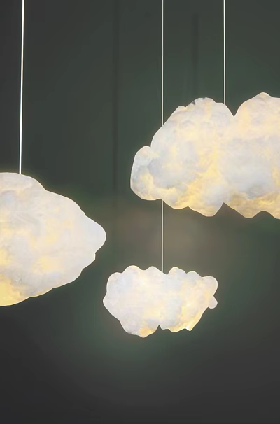 Three Cloud Shaped Chandeliers Hanging With Soft Glowing Light In Dark Background 3d model