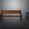 Red Wooden Bench With Metal Legs And Trash Can On Reflective Floor Gray Background