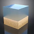 Layered Cube Structure With Transparent Blue Top And Brown Granular Base