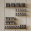 Various Bottles Arranged On Wooden Shelves With Different Styles And Sizes