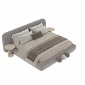 Modern Upholstered Double Bed With White And Brown Pillows Striped Linens And Round Nightstands