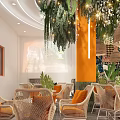 Modern Thai Milk Tea Shop With Lemon Tea And Green Plant Seating Area