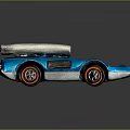 Blue Toy Race Car With Silver Top Red Rimmed Wheels And Shiny Metallic Finish