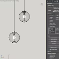 Two Stylish Spherical Glass Pendant Lights Illuminated Against Gray Background