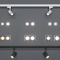 Modern Downlights and Spotlights Lighting Fixtures with Various Styles Illuminated on Gray Wall