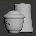 White Ceramic Salt And Pepper Shakers With Green Decorative Patterns For Kitchen 3d model