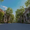 Spacious Road With Green Trees And Residential Buildings Under Clear Sky
