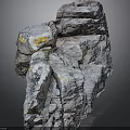 Natural Rock Formation With Detailed Surface Texture And Yellow Stains
