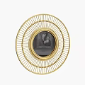 Round Gold Decorative Mirror With Radial Frame And Central Image For Home Decor