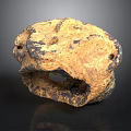 Naturally Formed Brown Stone With Irregular Holes Black Spots And Textured Surface