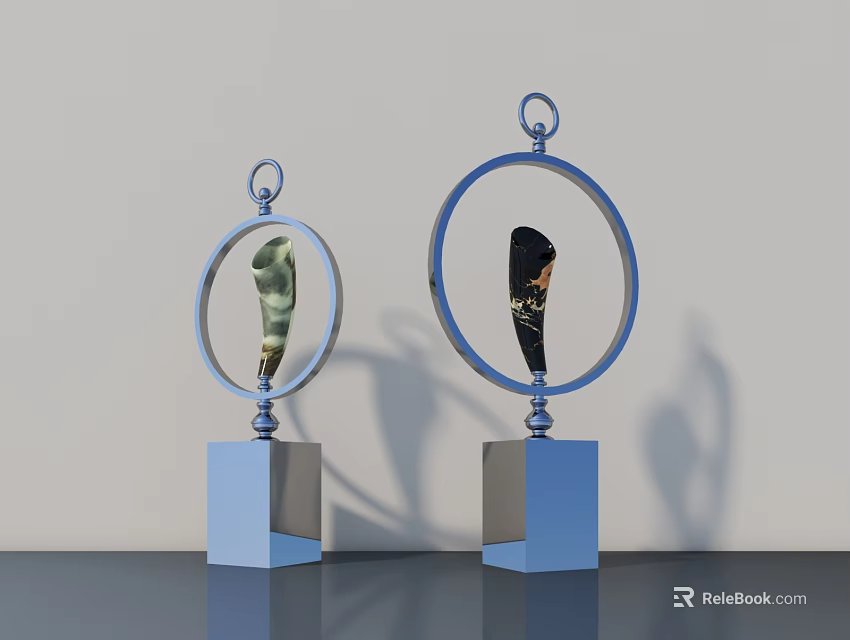 Modern Decorative Sculpture Carvings With Circular Frames On Blue Bases 3d model