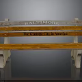 Rustic Wooden Bench With Baltimore And The Greatest City In America Inscriptions And Concrete Legs