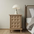 Wooden Bedside Table With White Lamp Next To Modern Bedroom Bed