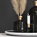 Elegant Decorative Ornament Set With Black Glass Vases Golden Rims Pampas Grass And White Candle
