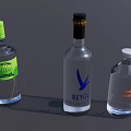 Three Clear Glass Wine Bottles Featuring Stylish Labels and Various Colored Caps