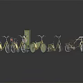 Multiple Yellow Bicycles In Various Styles With Reflective Surfaces On Dark Background