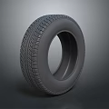 3D Rendered Car Tire With Detailed Tread Pattern Isolated On Gray Background
