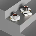 Hot Coffee Drinks In Ceramic Mugs On Gray Steps With Books And Spoons