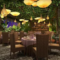 Lush Greenery Banquet Hall With Hanging Lantern Lights Dining Tables And Stone Floor