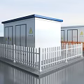 Outdoor White Box Type Buildings With Blue Roofs Enclosed By White And Orange Fences