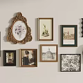 Diverse Framed Art Collection With Various Themes And Styles On White Wall