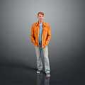 A Man Standing In Gray Background Wearing Orange Jacket Blue T-shirt And Light Blue Jeans