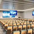 Modern Conference Room With Green Seats Wooden Armrests And World Map Screens