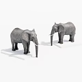 Two Grey Elephant Statues With Ivory Tusks On White Bases