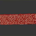 Rice Crispy Treat with Orange and Pink Sprinkles on Black Surface with Reflection