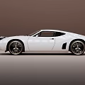 White Sports Car With Sleek Modern Body And Stylish Alloy Wheels Design