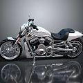 Sleek Modern Motorcycle With Silver Body Black Seat And Shiny Engine On Reflective Surface