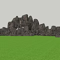 Garden Ornament With Natural Rock Formations Green Grass And Trees Under Blue Sky