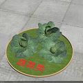 Three Fresh Green Cabbages on Round Green Tray with Red Vegetable Category Text