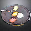 Delicious Assorted Food On Black Plate With Lemon Slices Cream Orange And Sauce