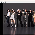 Women with cameras standing in a line with various outfits on gray background
