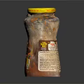 Spicy Sauce Glass Jar With Yellow Lid And Orange Content On Dark Background