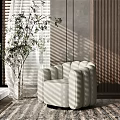 Elegant Modern Curved Beige Upholstered Single Sofa By Window With Green Plant And Sunlight Shadows