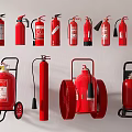 Different Types Of Red Fire Safety Equipment With Portable And Wheeled Extinguishers