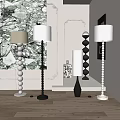 Modern Floor Lamps With Spiral Bases And Cylindrical Shades In Living Room