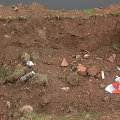 Construction Site Excavation Area With Loose Soil Debris And Scattered Waste Materials