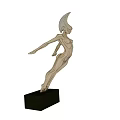 Golden Female Figure Sculpture On Black Base Against Blue Sky Sandy Landscape
